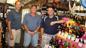 Steven, Denis and Jason Deschamps of Champs Discount Liquors.