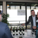 Tom Deaso, Regional Sales Manager, Ridge Vineyards discusses the wines with trade guests.