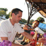 Michael Kolesar, Bar Manager, L’escale with John Freitas, Assistant Manager and Sommelier, L’escale, pouring Taittinger samples for guests.