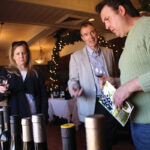 Chris and Melissa Jean, Owners, Casa Bacchus speaking with Paul Cullen, CT State Manager, Angelini Wine.