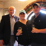 Matt Carpenter, Sales Representative, Angelini Wine with Molly Cannon, Wait Staff and Steven Gray, Food and Beverage Manager, both of Clinton Country Club.