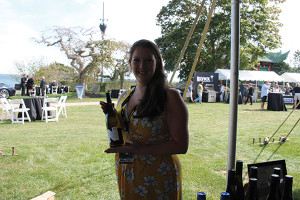 Molly Peabody, Sales Representative, M.S. Walker with Newport Vineyards wine.