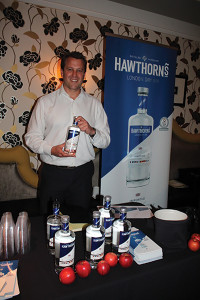 Nick Masters of 180 East Ltd., with Hawthorne’s London Dry Gin.