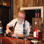 Kent Harrigan, Distiller & Whiskey Maker, Onyx Spirits Company, pouring.