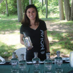 Jackie Skelly pouring samples of Avion Tequila and lemonade cocktails.