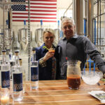 Cindy and Bill Dorsey, Partners in Waypoint Spirits, mixing Bloody Marys.