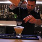 Rob Martini, Bar Manager, Camps, mixing the “Angry Canadian Mountie.”