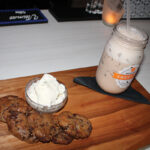 Dessert and cocktail pairing, featuring house made maple bacon chocolate chip cookies with vanilla ice cream with Martini’s “Maple Milkshake.”