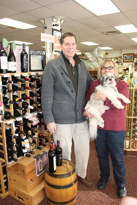 Jim Panzica, Store Manager and Doris Bowlby, Owner with Wine World's Shih Tzu, Buddy.