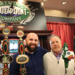 Eric Levine and Mike Rosen of Levine Distributing Company at the beer festival, upstairs from the wine tasting.