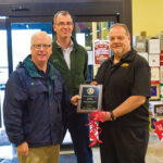 Danbury Mayor Mark D. Boughton (left) presented an award to Michael Berkoff (right), President/CEO of BevMax, LLC, at the Grand Opening celebration. With them is Stephan Rapaglia, Chief Operating Officer and Real Estate Counsel of Urstadt Biddle Properties, Inc. (middle).