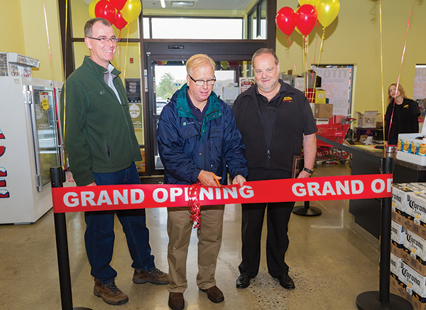 Stephan Rapaglia, COO & Real Estate Counsel of Urstadt Biddle Properties, Inc.; Danbury Mayor Mark D. Boughton; and Michael Berkoff, President/CEO, BevMax, LLC officially open the Danbury store for business with a ribbon cutting.