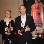 David Eber, President, Santa Maria Imports; Angelica Bianchetti, Brand Ambassador, Santa Maria Imports, pouring J.R. Revelry Bourbon.