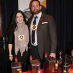 Joe Swanson, Northeast Regional Sales Manager, Classic Imports with Merceles Mendez-Swanson, pouring products from Benromach Distillery for Northeast Beverage Corp.