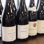 A lineup of Michael Corso selections: Jacques Girardin Bourgogne Pinot Noir, Jacques Girardin Santenay 1er Cru Clos Rousseau; Domaine Gilles Cote de Nuit–Village; Domaine Gilles Bourgogne Pinot Noir; and Domaine Gille Vosne Romanee.