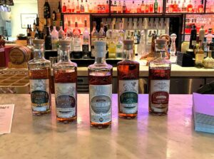 Filibuster Distillery The Boondoggler Whiskey; Filibuster Distillery Straight Bourbon Whiskey; Filibuster Distillery Bottled-in-Bond, winner of World Whiskies Awards 2023 Best American Non-Kentucky Small Batch Bourbon; and Filibuster Distillery Straight Rye Whiskey.