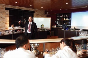 In the Wine and Spirits Tasting Lab in the Center for Culinary Excellence at Johnson & Wales University's Providence campus, students focus on sensory evaluation and the relationship between food, wine and other beverages. Edward Korry is shown teaching.