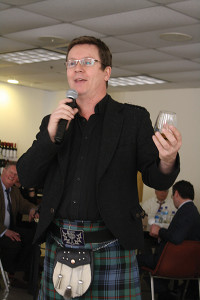 Simon Brooking singing a toast.