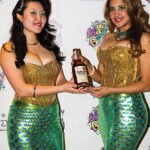 Mermaid models with Sugar Island Rum.