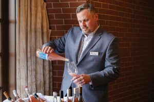 Josh Slocum, Fine Wine Sales and Brand Manager, MS Walker, pouring an Oregon Pinot Noir rosé from Patton Valley Vineyard.