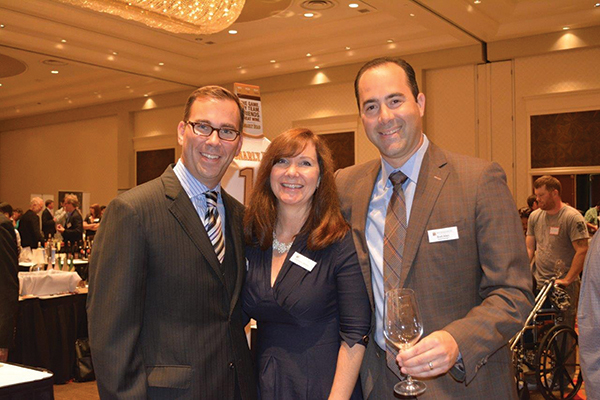 Justin Sullivan, Assistant General Manager; Kathleen Stadler, Marketing Coordinator; Brett Allen, General Manager, all from MS Walker.