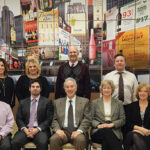 Hartley & Parker's management team, 2015. Back Row: Frank LaTorra, Sales Manager; Carla Sager, Graphic Design Manager; Paula Latham, Accounting Manager; Mike Bylo, Controller; Bill Saroka, Wine Director; Althea Alexander, Credit Manager; and Blaise Tramazzo, Spirit Director. Front Row: Donnie Gallant, Warehouse Manager; Paul Angelico, General Sales Manager; David Rosenberg, Vice President; Jerry Rosenberg, President; Mindy Rosenberg, Assistant to the President; Joyce Halkowicz, Customer Service Supervisor; Gary William, IT Manager. Missing from photo: Pat Oates, Warehouse Manager and Murray Smiling, Night Crew Manager.