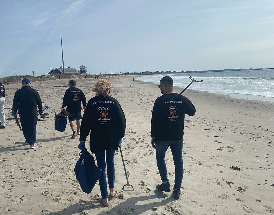 Mancini Beverage and Tito’s Partner on Beach Cleanup Day