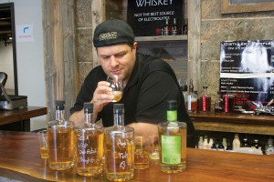 Reppucci taste-testing in the distillery for their Summer Hop Whiskey. 