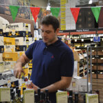 George Mitas pouring a taste of Muses Estate.