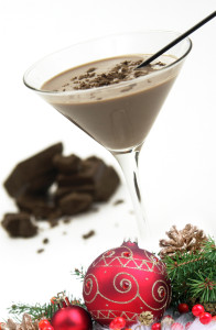 Mistletoe Martini 1.5 oz. Devotion Vodka Black & Blue 1 oz. Kahlua 1 oz. Bailey's Irish Cream 1 oz. White Crème de Cocoa   Pour all ingredients into a martini shaker filled with ice. Shake and strain mixture into a martini glass, and garnish with chocolate shavings. 