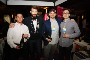 Shown at the Sun WineFest are Sales Representatives Branden Hylwa and Hunter, President Matt Murphy, and Kheder Hassounm, owner of Safita Restaurant in Fairfield, recently named Best Middle-Eastern Restaurant by Connecticut Magazine. Photo by Chris Almeida.