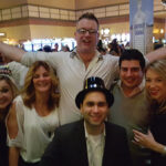 Art Chamberland (back center), Pernod Ricard Portfolio Manager, Rhode Island Distributing Co. with Carlos DeOlivera (front center) of Rhode Island Distributing Co. and Amanda Soumelidis (far right) of Rhode Island Distributing Co., celebrating New Year’s Eve with guests at The Lighthouse Bar in Twin River Casino.