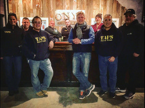 Adam von Gootkin, Co-founder of Onyx Moonshine, seen (in scarf) with the TAPS crew on February 6, 2016. The crew set up equipment in the distillery to test for paranormal activity. 