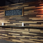 The tasting room features a wall made from oak stave.