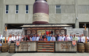 Leigh Ann Lengyel, Regional Sales Manager of Ole Smoky Distillery (center left, first row), kicked off Ole Smoky Moonshine's Lightnin’ line with the Hartley & Parker sales force. Leigh Ann Lengyel, Regional Sales Manager of Ole Smoky Distillery (center left, first row), kicked off Ole Smoky Moonshine's Lightnin’ line with the Hartley & Parker sales force.