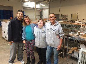 Caleb Davila, Job Coach, MARC, Inc.; Alison Dion, MARC Employee; Allison Cornelius, MARC Employee; and Eryka Wright, Production Manager, Onyx Spirits Company.