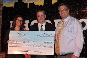 Kim Ward, Director of Community and Public Affairs, Twin River Casino; T. Joseph Almond, Administrator, Town of Lincoln; and Craig Sculos, Vice President and General Manager, Twin River Casino.