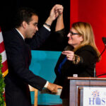 RI Hospitality Association’s President and CEO Dale Venturini welcomes Providence Mayor Angel Taveras to the stage with a little salsa dancing.