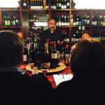 Bertocci addresses guests at Madison Wine Shop