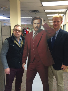 Shown are Slocum & Sons’ Key Account/Spirits Manager Alex Meier-Tomkins with a life-sized Ron Burgundy cut-out and Drew Barter, New Haven County Regional Manager. 