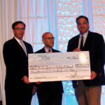 John Taylor, Jr., Chairman, Twin River Worldwide Holdings, Inc.; Andrew Schiff, CEO, RI Community Food Bank; Craig Sculos, Vice President and General Manager, Twin River Casino.