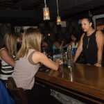 Twin River employees behind the bar and as guests at Vanity. Photo by Chris Almeida.