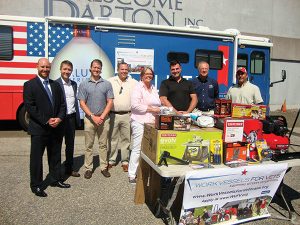 Mike Heins, Trade Development Manager, Brescome Barton; Ryan Dunne, Salute American Vodka; Michael Lutz, Salute American Vodka; Frank Gaglio, Work Vessels for Vets; Cathy Cook, Executive Director, Work Vessels for Vets; Veteran U.S. Navy Petty Officer James Wright; John Niekrash, Chairman, Work Vessels for Vets; Scott Sweitzer, Salute American Vodka. Mike Heins, Trade Development Manager, Brescome Barton; Ryan Dunne, Salute American Vodka; Michael Lutz, Salute American Vodka; Frank Gaglio, Work Vessels for Vets; Cathy Cook, Executive Director, Work Vessels for Vets; Veteran U.S. Navy Petty Officer James Wright; John Niekrash, Chairman, Work Vessels for Vets; Scott Sweitzer, Salute American Vodka.