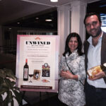 Baracchi holds a bottle of his Brut Trebbiano with guest Elaine Beame at the Water’s Edge event.