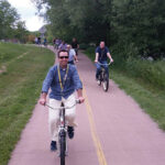 Northeast Beverage Corp. of CT members on New Belgium-provided bikes in Fort Collins, Colorado along the Poudre River path leading into downtown.