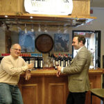 Baracchi shares a taste during an event at Black Bear Wines and Spirits in Westport.