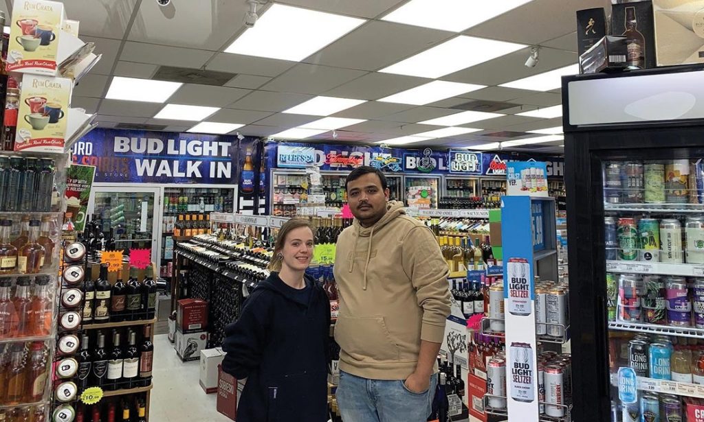 Branford Wine &amp; Spirits’ Tina Robida and Ankur Patel, Owner.