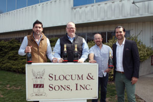 Noah King-Smith, Key Account Manager Hartford/New Haven, Slocum & Sons; Paul Burne, Key Account Manager Fairfield/Litchfield, Slocum & Sons; Alex Meier-Tomkins, Boutique & Craft Brands Director, Slocum & Sons; Brenton Blanchard, ABCK Corp., outside of Slocum & Sons with Chapel Down wines.