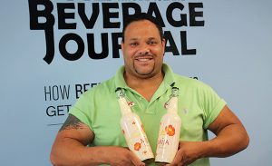 Darchell Wilson, Sales Representative, Latitude Beverage with Mija White Sangria.