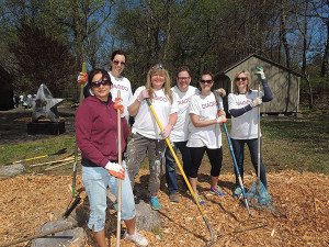 Diageo employees spread more than six truckloads of mulch around the STAR Center.